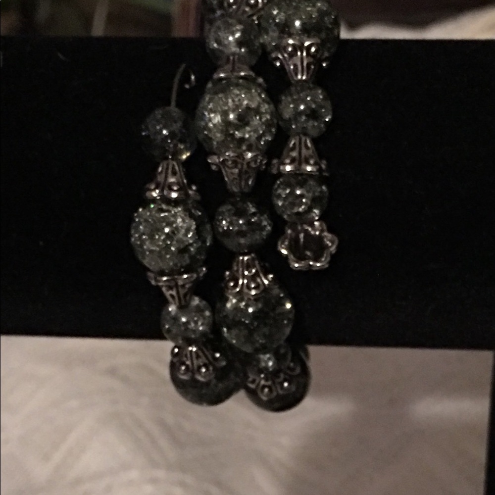 Bracelet and a pair of earrings